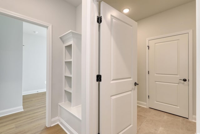 hallway featuring light wood-type flooring