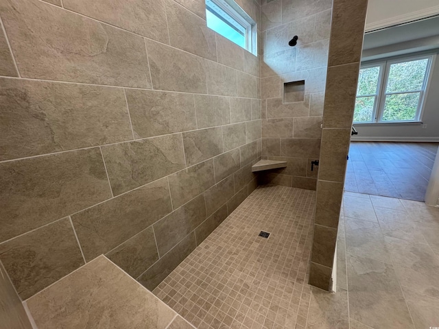 bathroom featuring tiled shower