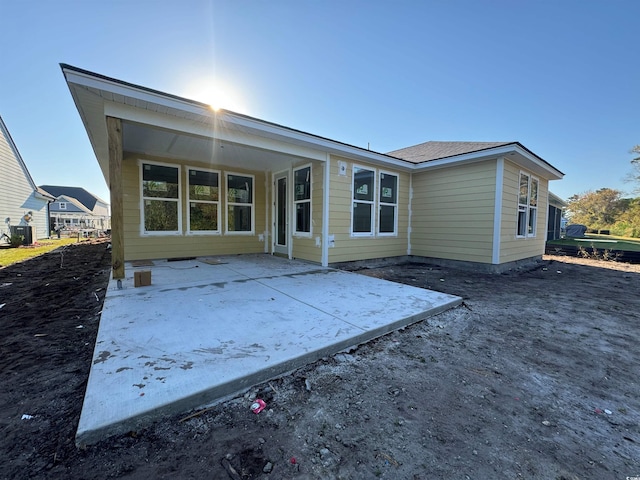 back of house featuring a patio