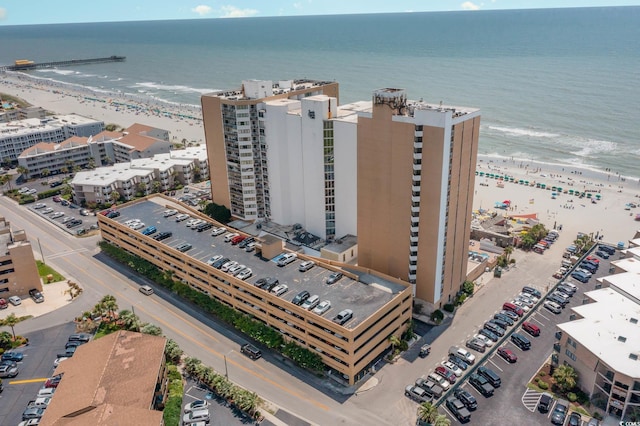 drone / aerial view with a view of the beach and a water view