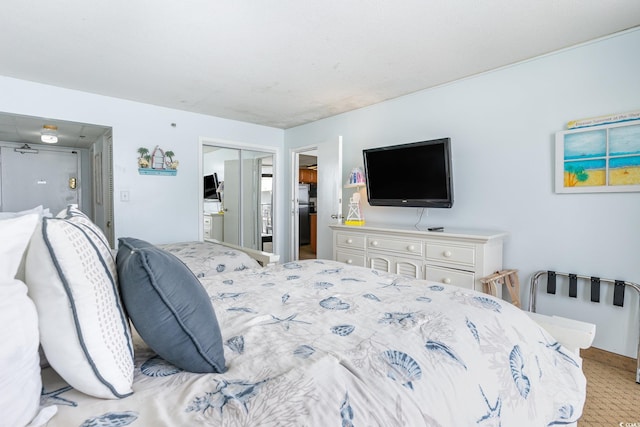 carpeted bedroom with a closet