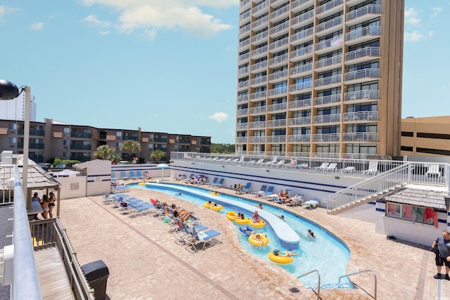 view of pool featuring a patio