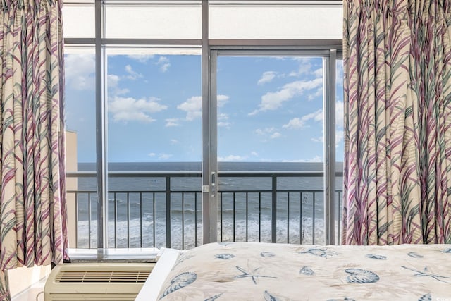 unfurnished bedroom featuring a water view