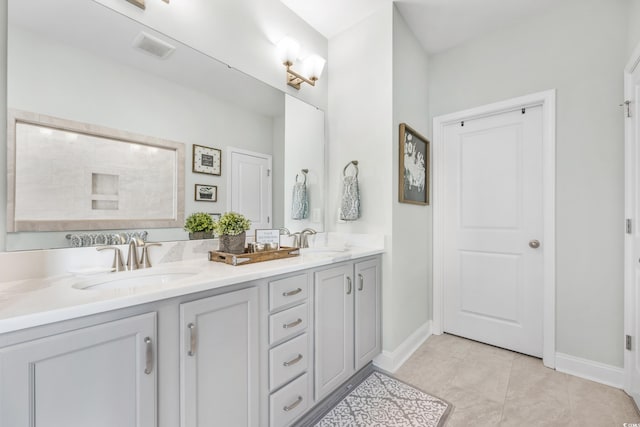 bathroom featuring vanity and tile patterned floors