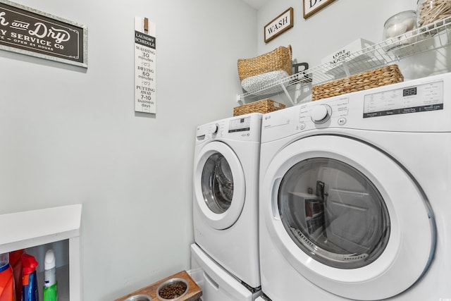 laundry area with washing machine and dryer