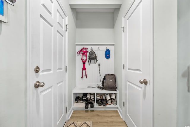 mudroom with light hardwood / wood-style flooring