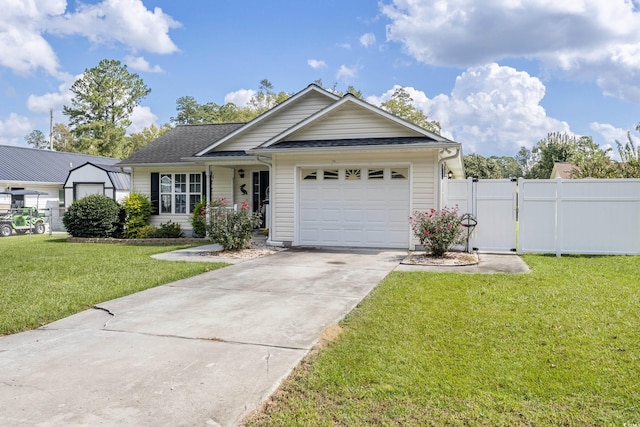 view of front of house featuring a garage and a front lawn