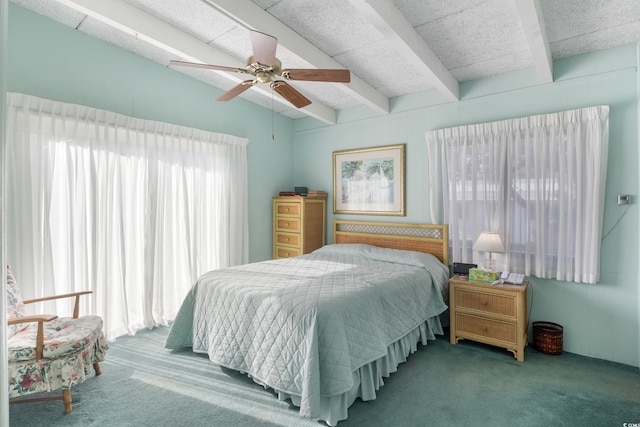 carpeted bedroom with lofted ceiling with beams, multiple windows, and ceiling fan