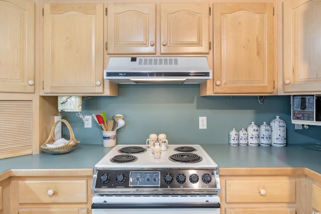 kitchen featuring light brown cabinets, stainless steel range with electric stovetop, and exhaust hood