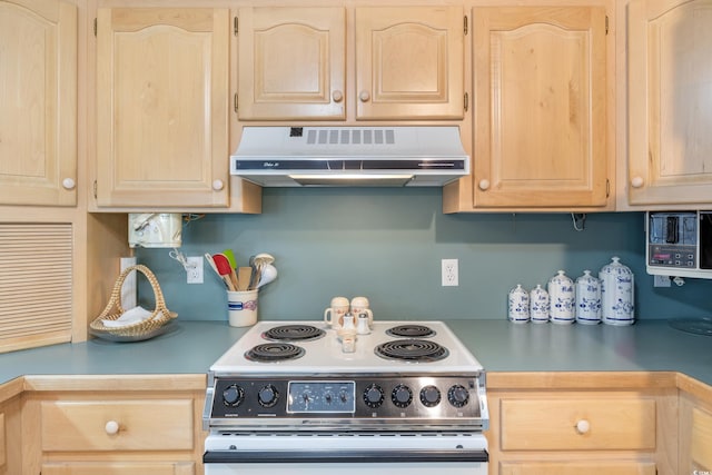 1000 Strand Ave, North Myrtle Beach, SC 29582 - kitchen featuring range with electric cooktop, exhaust hood, light brown cabinetry, and light countertops