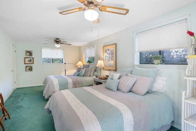 1000 Strand Ave, North Myrtle Beach, SC 29582 - bedroom with carpet floors, baseboards, and a ceiling fan