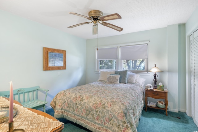 carpeted bedroom with a closet and ceiling fan