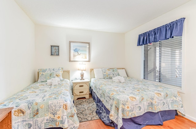 bedroom featuring hardwood / wood-style flooring