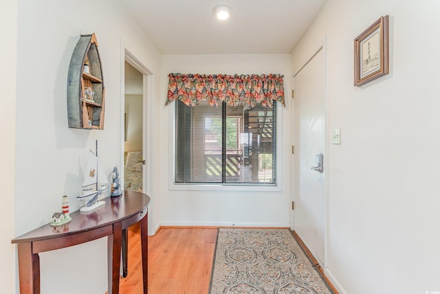 doorway featuring light wood-type flooring