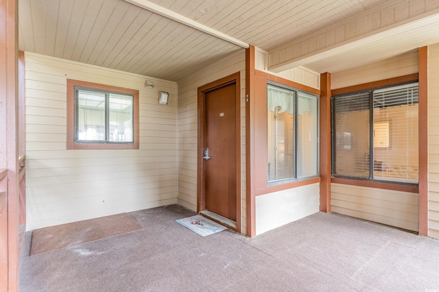 doorway to property with a patio