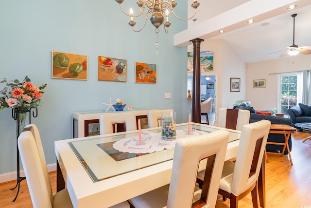 4839 Seabreeze Ln, Myrtle Beach, SC 29579 - dining space with baseboards, light wood-style floors, recessed lighting, ceiling fan with notable chandelier, and lofted ceiling