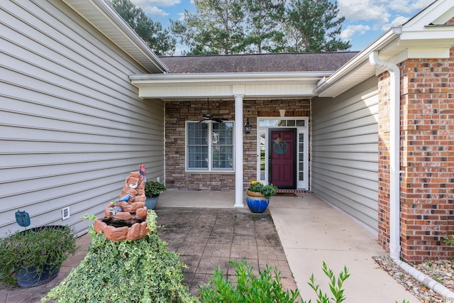 property entrance featuring covered porch