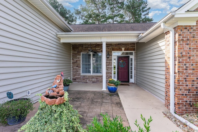 4839 Seabreeze Ln, Myrtle Beach, SC 29579 - entrance to property with stone siding, covered porch, and roof with shingles