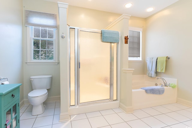 full bathroom featuring tile patterned flooring, independent shower and bath, vanity, and toilet