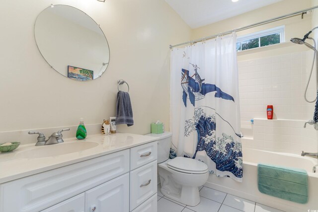 full bathroom with vanity, tile patterned floors, toilet, and shower / bath combo