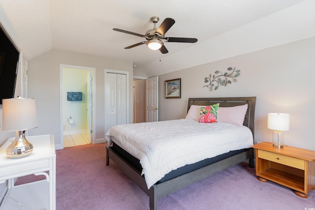 4839 Seabreeze Ln, Myrtle Beach, SC 29579 - bedroom with a closet, ensuite bath, a ceiling fan, light carpet, and lofted ceiling