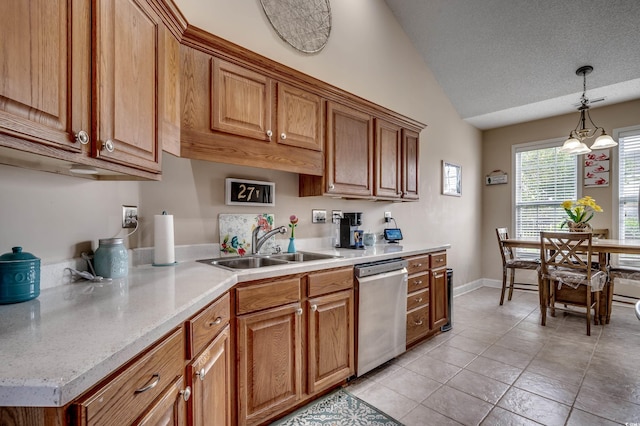 kitchen with lofted ceiling, hanging light fixtures, stainless steel dishwasher, a textured ceiling, and a notable chandelier