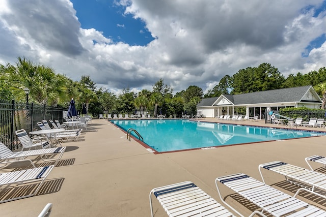 view of swimming pool featuring a patio