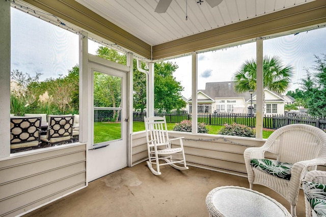 sunroom / solarium with ceiling fan