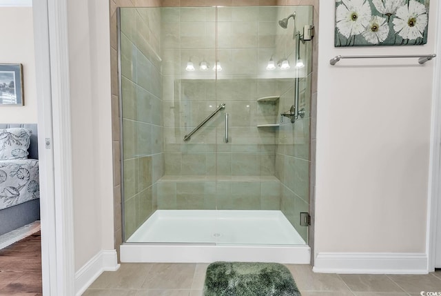 bathroom featuring tile patterned flooring and walk in shower