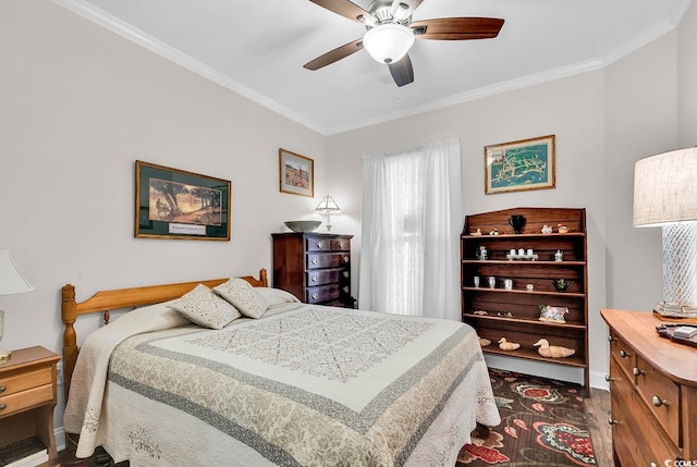 bedroom featuring ornamental molding, ceiling fan, and hardwood / wood-style flooring