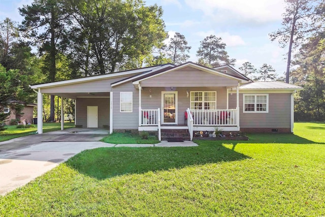 view of front of house with a front lawn, a carport, and a porch