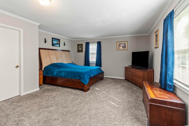 carpeted bedroom featuring ornamental molding and a textured ceiling