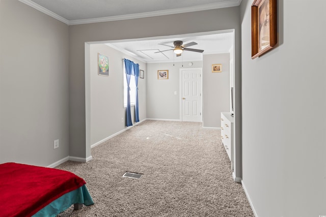 interior space featuring carpet flooring and ornamental molding