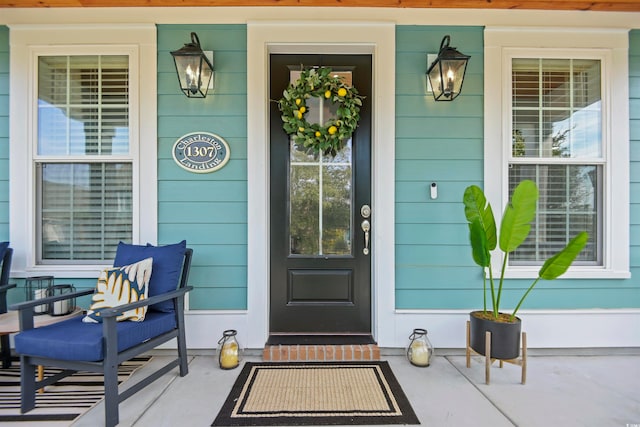 entrance to property with covered porch