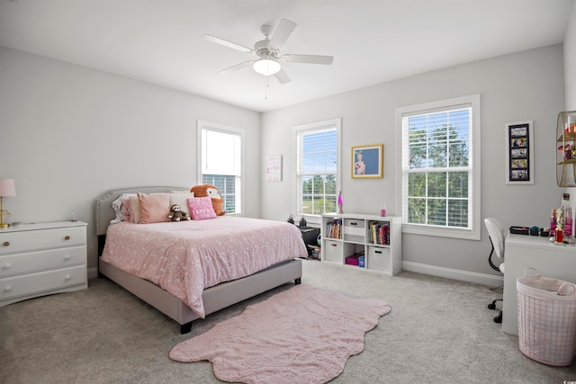 carpeted bedroom featuring ceiling fan