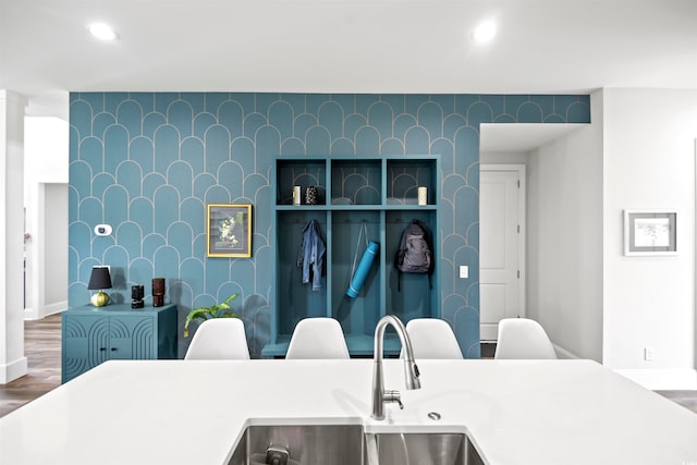 kitchen featuring hardwood / wood-style floors and sink