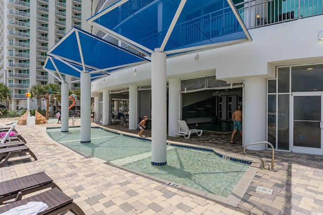 view of pool with a patio