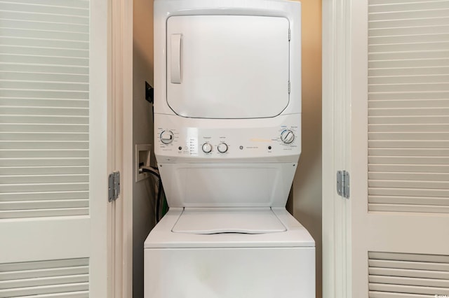 washroom with stacked washer / dryer