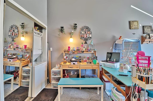 interior space featuring carpet and stacked washer and clothes dryer