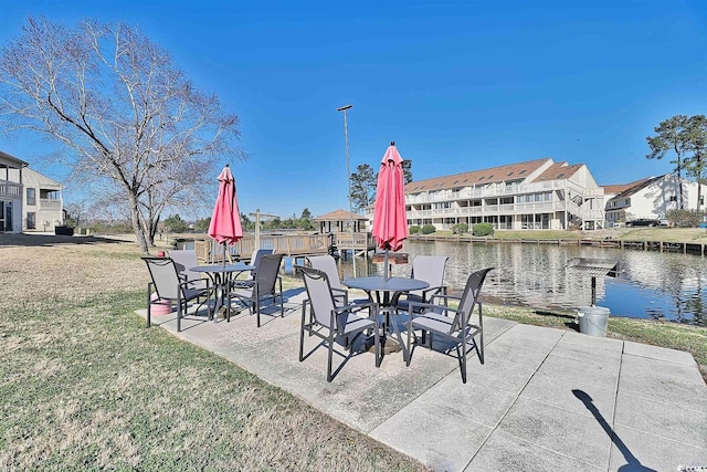 view of patio / terrace with a water view