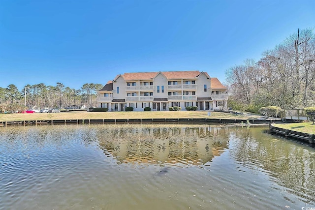 exterior space with a water view