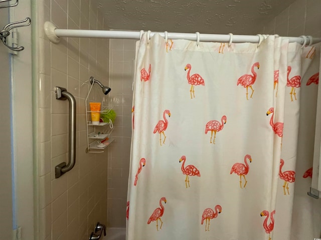 bathroom featuring curtained shower