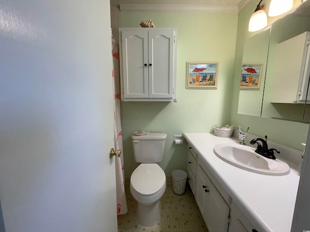 bathroom with ornamental molding, tile patterned floors, vanity, and toilet