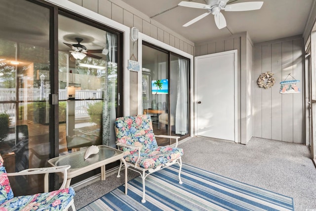 sunroom / solarium with ceiling fan and plenty of natural light