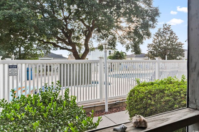 exterior space with a community pool