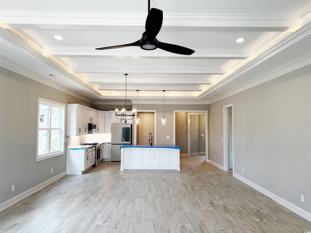 kitchen with white cabinetry, a kitchen island with sink, sink, light hardwood / wood-style floors, and stainless steel appliances