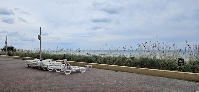 view of property's community featuring a water view