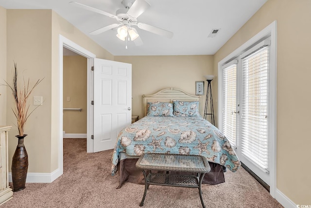 carpeted bedroom with ceiling fan and access to outside