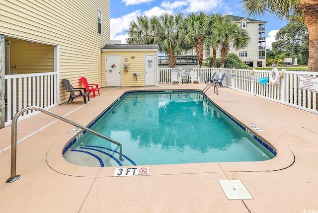 view of swimming pool featuring a patio