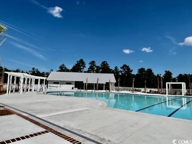 view of pool with a patio area